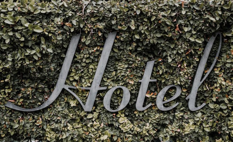 Hotel Sign in Vines